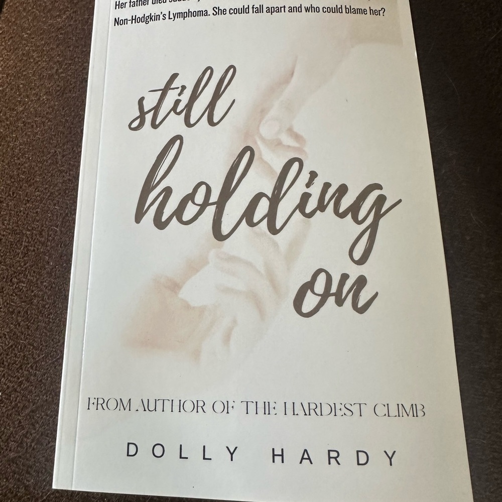Still Holding On by Dolly Hardy